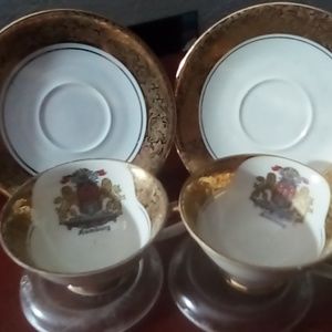 Langhagen & Harnisch Pair  Hamburg demitasse 24 karet painted teacups & saucers.